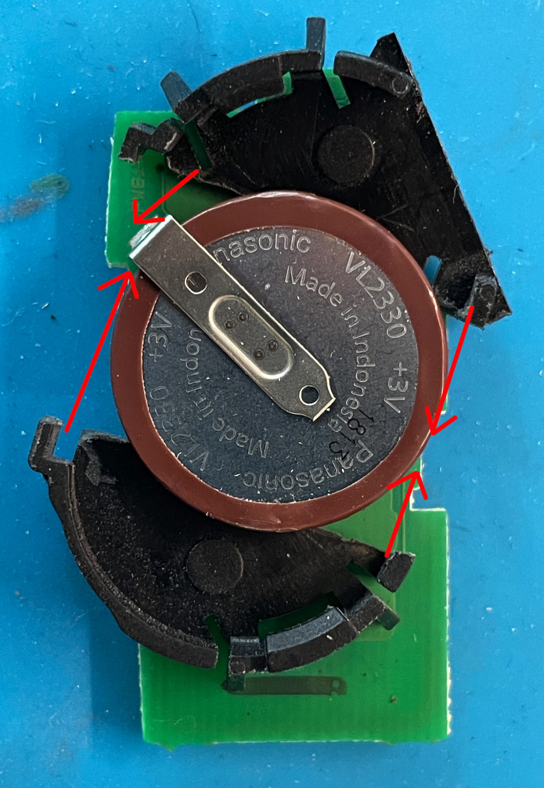 Batteriefach wieder positionieren